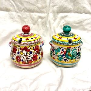 Pair of lidded pots signed on the bottom